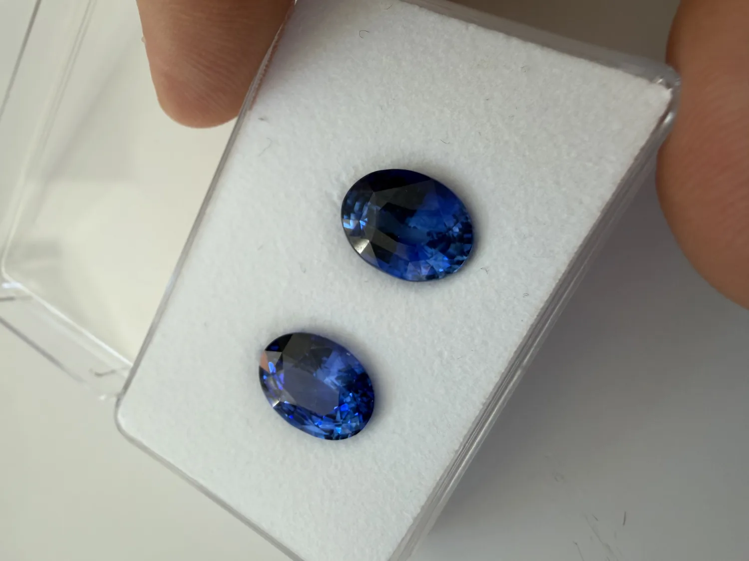 A pair of oval sapphires, royal blue, loose
