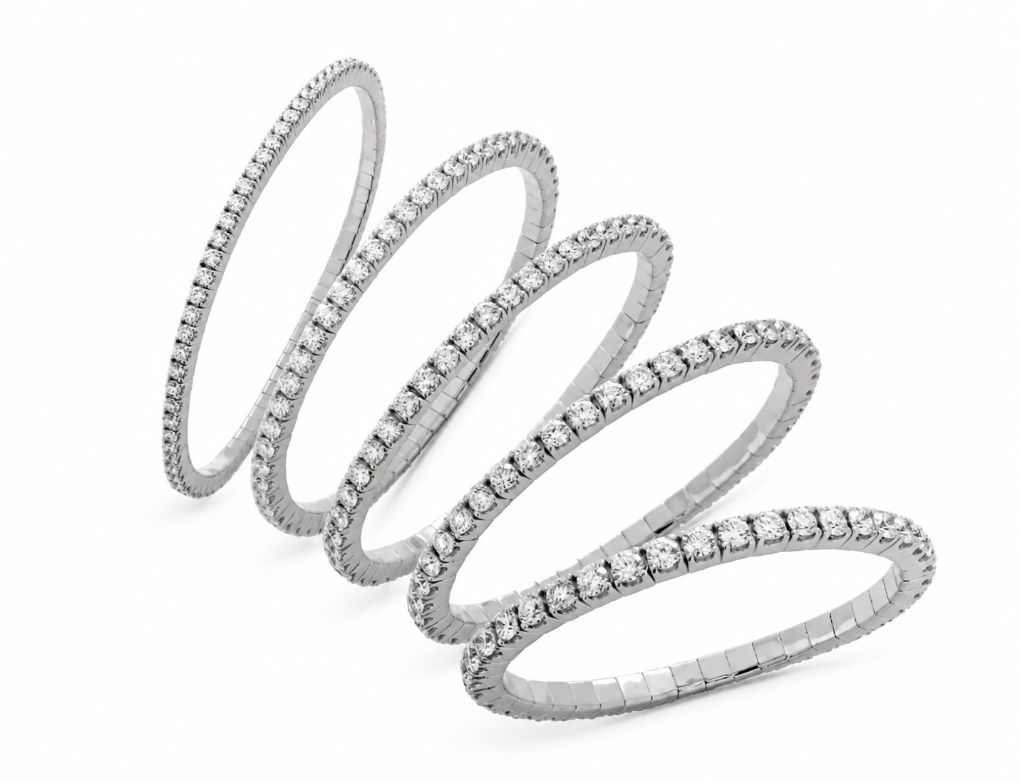 Infini Stretch-Tennisarmband in Weißgold in fünf Steingrößen, gestaffelt, ohne Verschluss